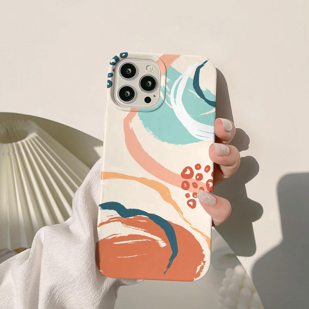 a person holding a phone case with a flower design