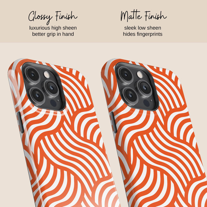 a pair of orange and white iphone cases